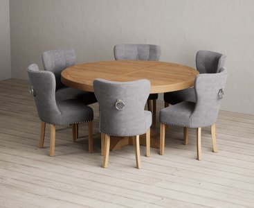 View Helmsley 150cm solid oak round pedestal dining table with 6 grey keswick chairs View Helmsley 150cm solid oak round pedestal dining table with 6 grey keswick chairs