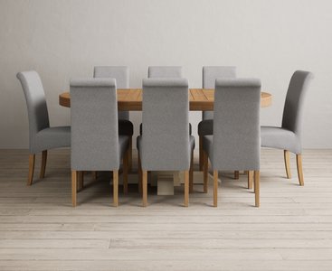 View Extending helmsley oak and cream painted pedestal dining table with 8 grey scroll back chairs View Extending helmsley oak and cream painted pedestal dining table with 8 grey scroll back chairs