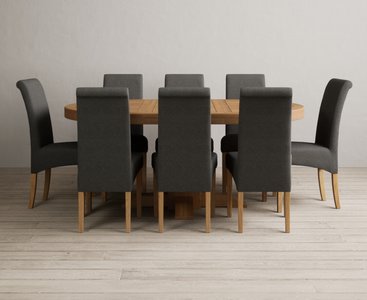 View Extending helmsley solid oak pedestal dining table with 8 charcoal grey scroll back chairs View Extending helmsley solid oak pedestal dining table with 8 charcoal grey scroll back chairs