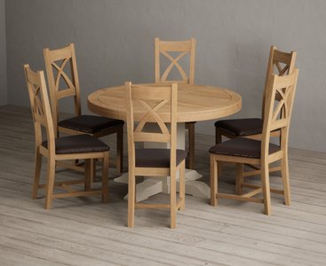 View Extending helmsley oak and cream painted pedestal dining table with 6 brown natural solid oak chairs View Extending helmsley oak and cream painted pedestal dining table with 6 brown natural solid oak chairs