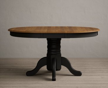 View Extending hertford 100cm - 130cm oak and black painted pedestal dining table View Extending hertford 100cm - 130cm oak and black painted pedestal dining table