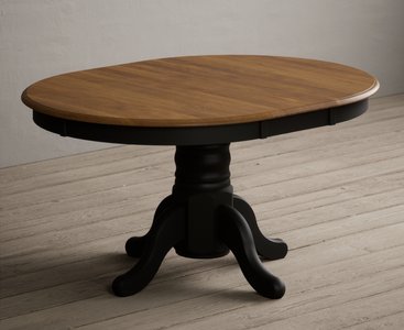 View Extending hertford 100cm - 130cm oak and black painted pedestal dining table View Extending hertford 100cm - 130cm oak and black painted pedestal dining table