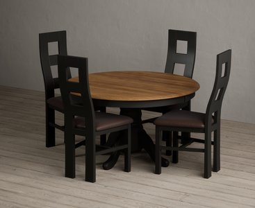 View Hertford 120cm fixed top oak and black painted round pedestal table with 4 brown painted chairs View Hertford 120cm fixed top oak and black painted round pedestal table with 4 brown painted chairs