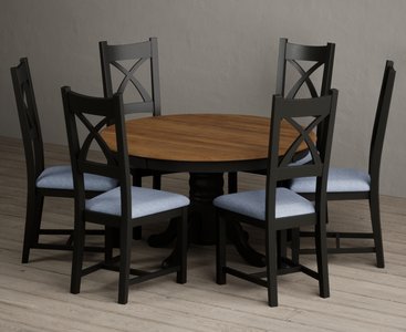 View Hertford 120cm fixed top oak and black painted round pedestal table with 6 blue painted chairs View Hertford 120cm fixed top oak and black painted round pedestal table with 6 blue painted chairs