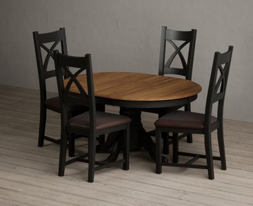 View Extending hertford 100cm - 130cm oak and black painted pedestal dining table with 4 brown painted chairs View Extending hertford 100cm - 130cm oak and black painted pedestal dining table with 4 brown painted chairs