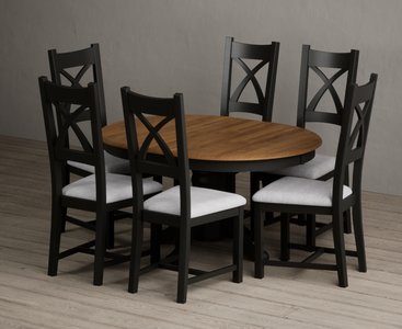 View Extending hertford 100cm - 130cm oak and black painted pedestal dining table with 6 light grey painted chairs View Extending hertford 100cm - 130cm oak and black painted pedestal dining table with 6 light grey painted chairs