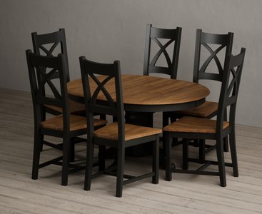 View Extending hertford 100cm - 130cm oak and black painted pedestal dining table with 6 rustic oak painted chairs View Extending hertford 100cm - 130cm oak and black painted pedestal dining table with 6 rustic oak painted chairs