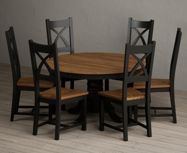 View Hertford 120cm fixed top oak and black painted round pedestal table with 6 rustic oak painted chairs View Hertford 120cm fixed top oak and black painted round pedestal table with 6 rustic oak painted chairs