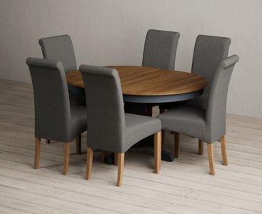 View Extending hertford 100cm - 130cm oak and dark blue painted pedestal dining table with 6 charcoal grey scroll back chairs View Extending hertford 100cm - 130cm oak and dark blue painted pedestal dining table with 6 charcoal grey scroll back chairs