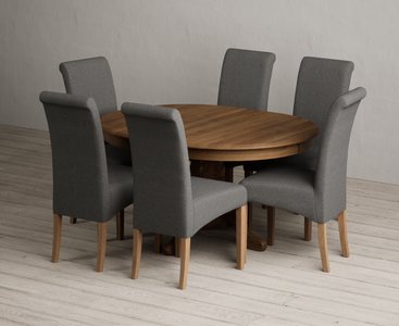 View Extending hertford 100cm - 130cm rustic oak pedestal dining table with 6 charcoal grey scroll back chairs View Extending hertford 100cm - 130cm rustic oak pedestal dining table with 6 charcoal grey scroll back chairs