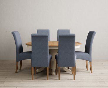 View Extending hertford 100cm - 130cm oak and cream painted pedestal dining table with 6 blue scroll back chairs View Extending hertford 100cm - 130cm oak and cream painted pedestal dining table with 6 blue scroll back chairs