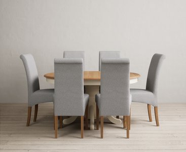 View Extending hertford 100cm - 130cm oak and cream painted pedestal dining table with 6 grey scroll back chairs View Extending hertford 100cm - 130cm oak and cream painted pedestal dining table with 6 grey scroll back chairs