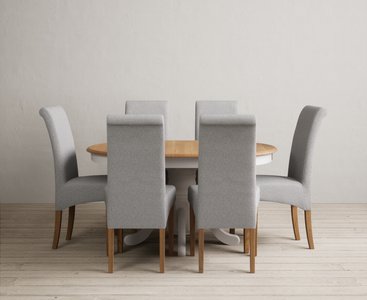 View Extending hertford 100cm - 130cm oak and soft white painted pedestal dining table with 6 grey scroll back chairs View Extending hertford 100cm - 130cm oak and soft white painted pedestal dining table with 6 grey scroll back chairs