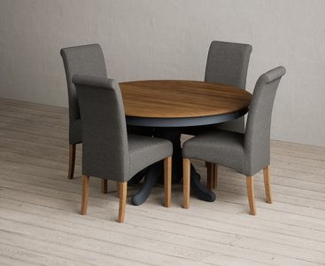 View Hertford 120cm fixed top oak and dark blue painted dining table with 4 blue scroll back chairs View Hertford 120cm fixed top oak and dark blue painted dining table with 4 blue scroll back chairs