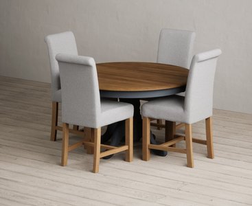View Hertford 120cm fixed top oak and dark blue painted dining table with 4 blue braced chairs View Hertford 120cm fixed top oak and dark blue painted dining table with 4 blue braced chairs