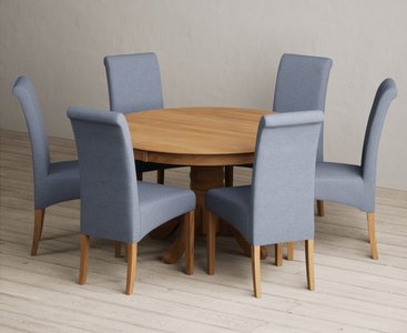 View Hertford 120cm fixed top solid oak round pedestal table with 6 blue scroll back chairs View Hertford 120cm fixed top solid oak round pedestal table with 6 blue scroll back chairs