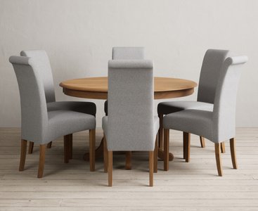 View Hertford 120cm fixed top solid oak round pedestal table with 6 grey scroll back chairs View Hertford 120cm fixed top solid oak round pedestal table with 6 grey scroll back chairs