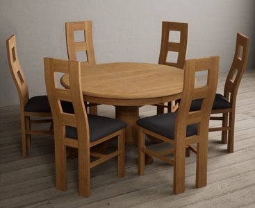View Hertford 120cm fixed top solid oak round pedestal table with 6 charcoal grey natural chairs View Hertford 120cm fixed top solid oak round pedestal table with 6 charcoal grey natural chairs