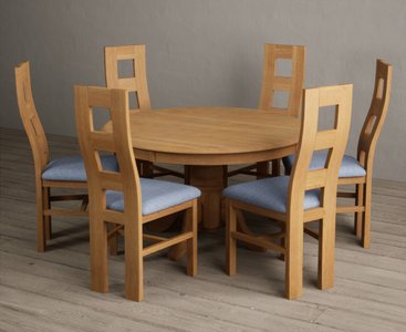 View Hertford 120cm fixed top solid oak round pedestal table with 6 blue natural chairs View Hertford 120cm fixed top solid oak round pedestal table with 6 blue natural chairs