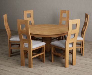 View Hertford 120cm fixed top solid oak round pedestal table with 6 light grey natural chairs View Hertford 120cm fixed top solid oak round pedestal table with 6 light grey natural chairs
