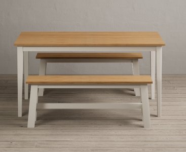 View Kendal 150cm solid oak and cream painted dining table with 2 cream benches View Kendal 150cm solid oak and cream painted dining table with 2 cream benches