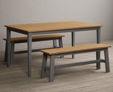 View Kendal 150cm solid oak and light grey painted dining table with 2 grey benches View Kendal 150cm solid oak and light grey painted dining table with 2 grey benches