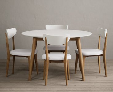 View Nordic 120cm round solid oak and signal white painted dining table with 4 white nordic chairs View Nordic 120cm round solid oak and signal white painted dining table with 4 white nordic chairs