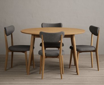 View Nordic 120cm round solid oak dining table with 4 grey nordic chairs View Nordic 120cm round solid oak dining table with 4 grey nordic chairs