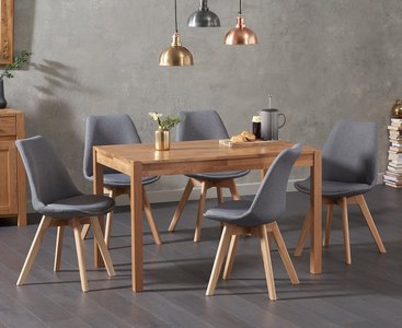 Photo of york 120cm solid oak dining table with 4 light grey orson chairs