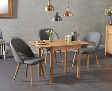 View Extending york 70cm solid oak drop leaf dining table with 4 grey hudson chairs View Extending york 70cm solid oak drop leaf dining table with 4 grey hudson chairs