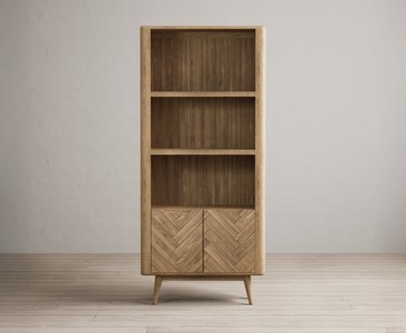 View Solid oak tall bookcase with cupboard | herringbone detail View Solid oak tall bookcase with cupboard | herringbone detail