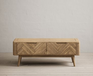 View Solid oak 4 drawer storage coffee table | herringbone detail View Solid oak 4 drawer storage coffee table | herringbone detail