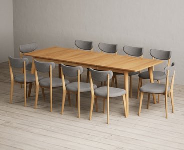 View Extending ruben 150cm retro oak dining table with 10 grey nordic chairs View Extending ruben 150cm retro oak dining table with 10 grey nordic chairs