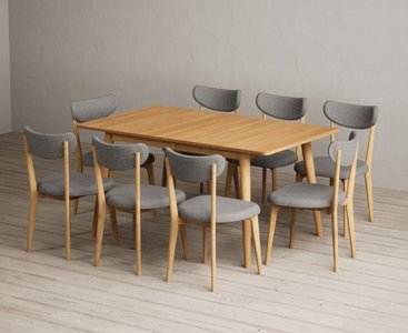 View Extending ruben 150cm retro oak dining table with 8 grey nordic chairs View Extending ruben 150cm retro oak dining table with 8 grey nordic chairs