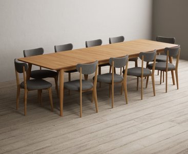 View Extending ruben 200cm retro oak dining table with 10 grey nordic chairs View Extending ruben 200cm retro oak dining table with 10 grey nordic chairs