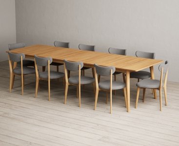 View Extending ruben 200cm retro oak dining table with 10 grey nordic chairs View Extending ruben 200cm retro oak dining table with 10 grey nordic chairs