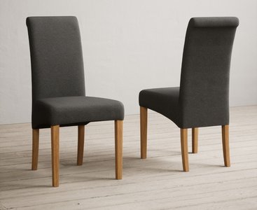 View Extending york 70cm solid oak dining table with 2 charcoal grey scroll back chairs View Extending york 70cm solid oak dining table with 2 charcoal grey scroll back chairs