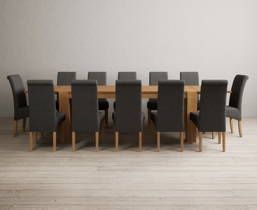 View Extending sheringham 200cm solid oak table with 12 charcoal grey scroll back chairs View Extending sheringham 200cm solid oak table with 12 charcoal grey scroll back chairs
