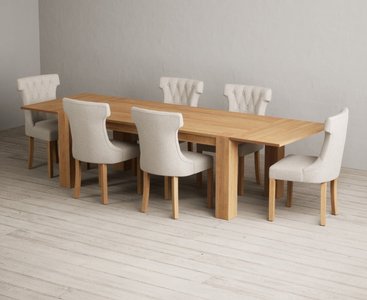 View Sheringham 200cm solid oak dining table with 12 grey clara chairs with sheringham oak extensions -pair- View Sheringham 200cm solid oak dining table with 12 grey clara chairs with sheringham oak extensions -pair-