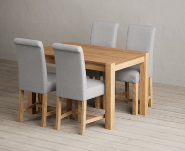 View Thetford 120cm solid oak dining table with 4 blue braced chairs View Thetford 120cm solid oak dining table with 4 blue braced chairs