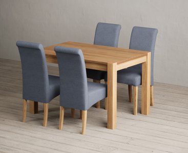 View Thetford 120cm solid oak dining table with 4 blue scroll back chairs View Thetford 120cm solid oak dining table with 4 blue scroll back chairs