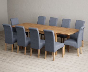 View Extending thetford 150cm solid oak dining table with 10 blue scroll back chairs View Extending thetford 150cm solid oak dining table with 10 blue scroll back chairs