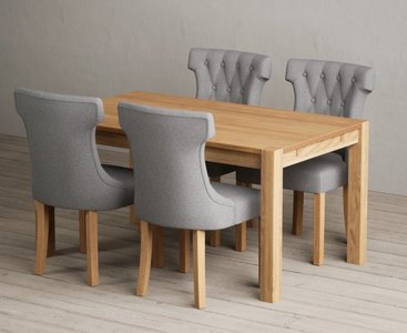 View Thetford 150cm oak dining table with 8 grey clara chairs View Thetford 150cm oak dining table with 8 grey clara chairs