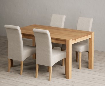 View Thetford 150cm solid oak dining table with 4 natural scroll back chairs View Thetford 150cm solid oak dining table with 4 natural scroll back chairs