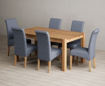 View Thetford 150cm solid oak dining table with 6 blue scroll back chairs View Thetford 150cm solid oak dining table with 6 blue scroll back chairs