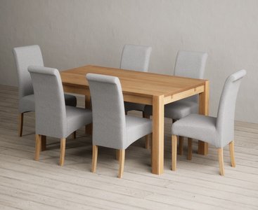 View Thetford 150cm solid oak dining table with 6 grey scroll back chairs View Thetford 150cm solid oak dining table with 6 grey scroll back chairs