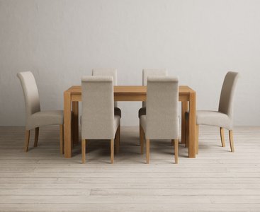View Thetford 150cm solid oak dining table with 6 natural scroll back chairs View Thetford 150cm solid oak dining table with 6 natural scroll back chairs