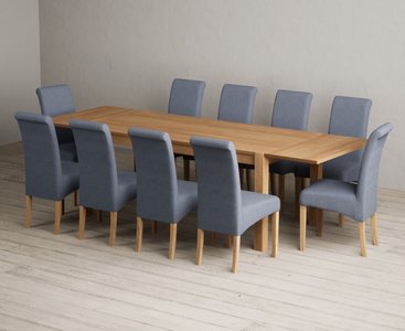 View Extending thetford 180cm solid oak dining table with 10 blue scroll back chairs View Extending thetford 180cm solid oak dining table with 10 blue scroll back chairs