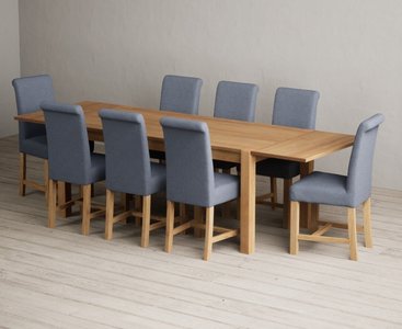 View Extending thetford 180cm solid oak dining table with 8 blue braced chairs View Extending thetford 180cm solid oak dining table with 8 blue braced chairs