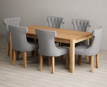 View Thetford 180cm solid oak dining table with 6 grey clara chairs View Thetford 180cm solid oak dining table with 6 grey clara chairs